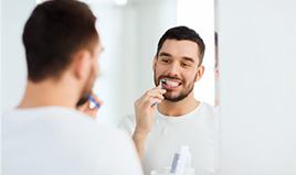 Man brushing teeth 